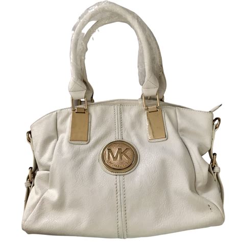 white and gold michael kors purse